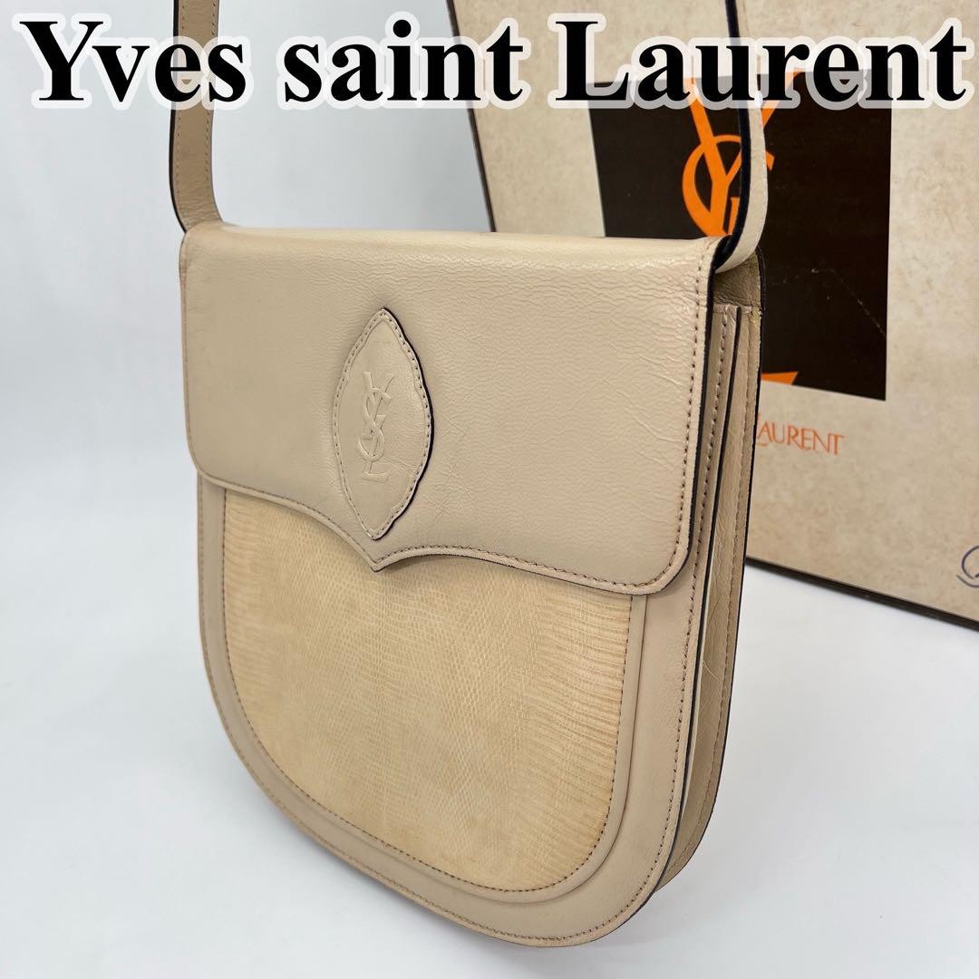 Borsa a tracolla Yves Saint Laurent Cassandra con logo e scatola in rilievo lucertola ecc