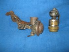 Two antique carbide lamps.  One is from the "City Gun Store" in Duluth Minnesota — photo 1