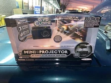 Mini LED Projector Portable For Up to 60" Screen Jakks Pacific EyeClops NEW