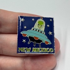 Listing image for New Mexico UFO Alien Enamel Lapel Pin Roswell Style Souvenir