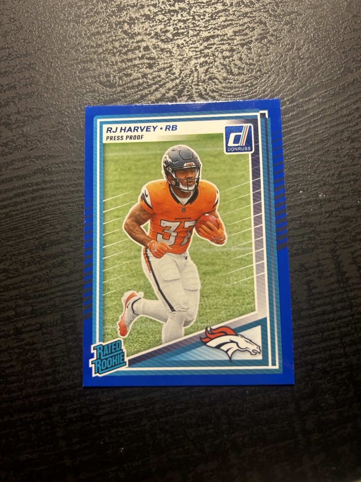 2025 Panini Donruss Rated Rookie RJ Harvey #312 Press Proof Blue