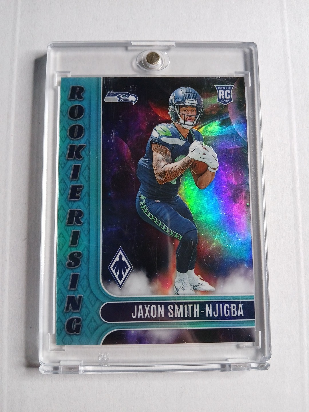 2023 Panini Phoenix - Rookie Rising Jaxon Smith-Njigba #RIS-9 Teal /150 (RC)