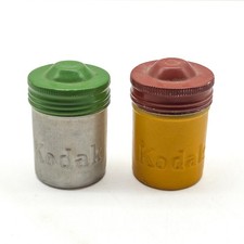 Vintage Kodak 35mm Film Canisters Lot of 2 Embossed Metal Multicolor Lids