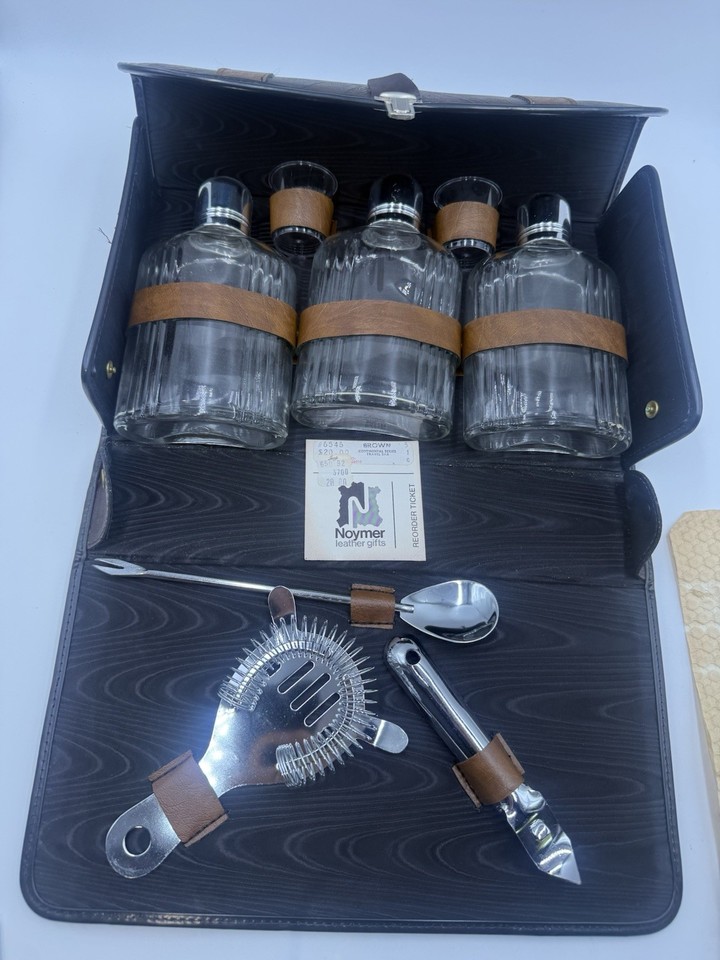 A compact antique Royalshire Noymer portable travel bar set in a mini case — the James Bond-approved way to have a proper drink absolutely anywhere.