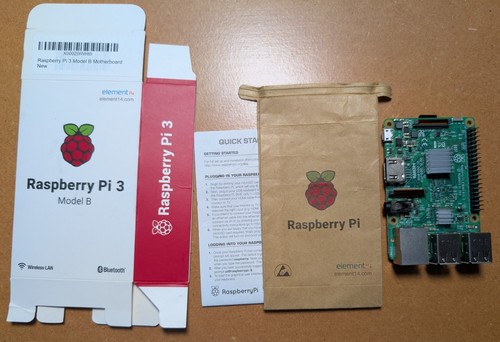 Raspberry Pi 3 Model B with original packaging and heatsinks
