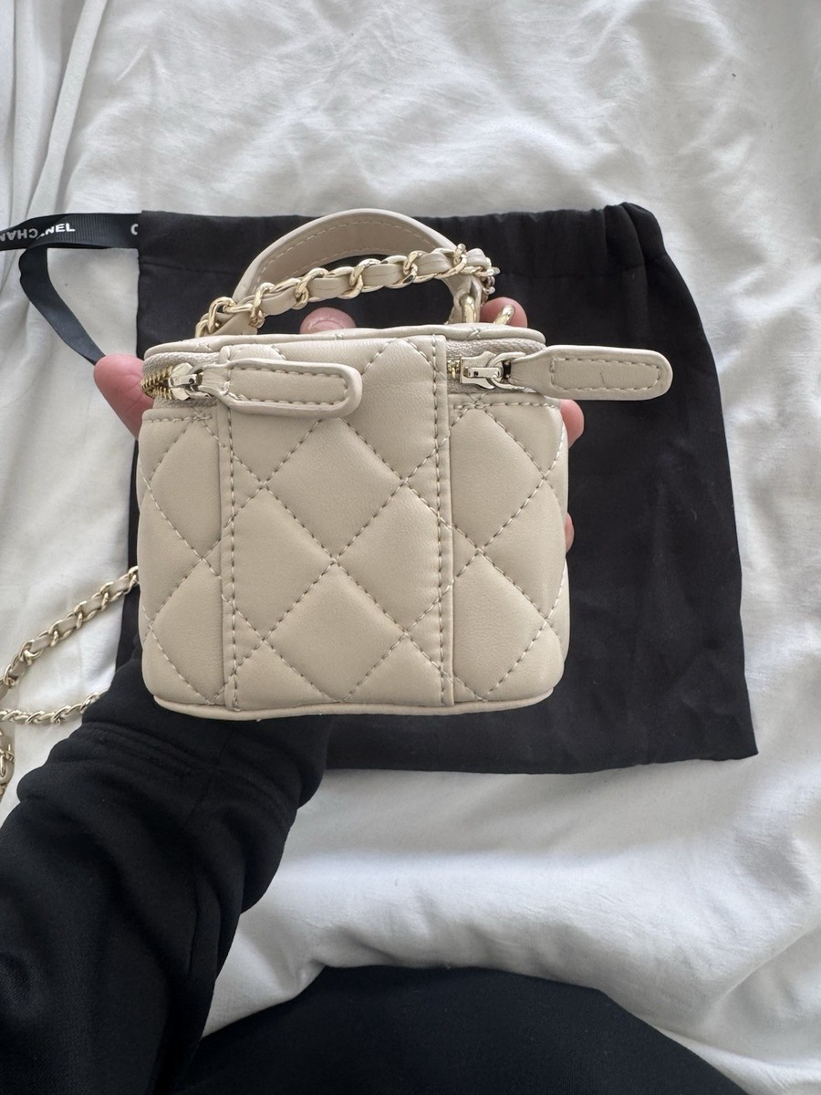 CHANEL Beige Quilted Leather Makeup Bag with Mirror, Zipper, Chain