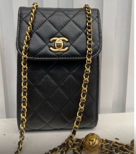chanel mini phone holder backpack Lambskin Quilted Camellia Bow Black 1576676  FASHIONPHILE Chanel Mini Phone Holder Backpack
