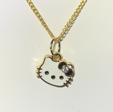 Small Gold Hello Kitty Charm Pendant On A Gold Necklace Chain 