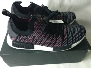 nmd r1 stlt solar pink