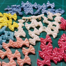 Lot of 118 Vintage Buttons DILL BOWS Shape Novelty 15mm Shank Plastic W Germany