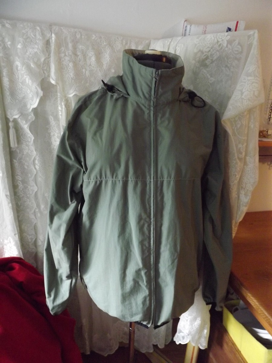 NEW women's RAIN JACKET 100% nylon ZIPS hood hides in collar NEW women's RAIN JACKET 100% nylon ZIPS hood hides in collar