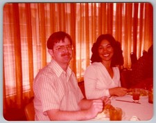 Vtg Color Snapshot Smiling Couple Dining At Restaurant Man With Mustache 1970s