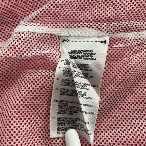 Chaqueta cortavientos mediana Adidas para mujer con cremallera completa cuello simulado ventilado salmón rosa - Imagen 8 de 11