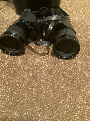 VINTAGE REVUE VERGUTETE OPTIK 7X50 4202 BINOCULARS. W/LEATHER CASE