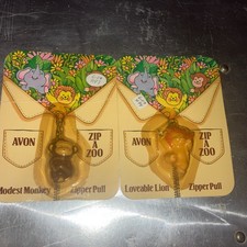 2 Vintage Avon Zip A Zoo Lovable lion Modest monkey Zipper Pull Charm 1983 NEW