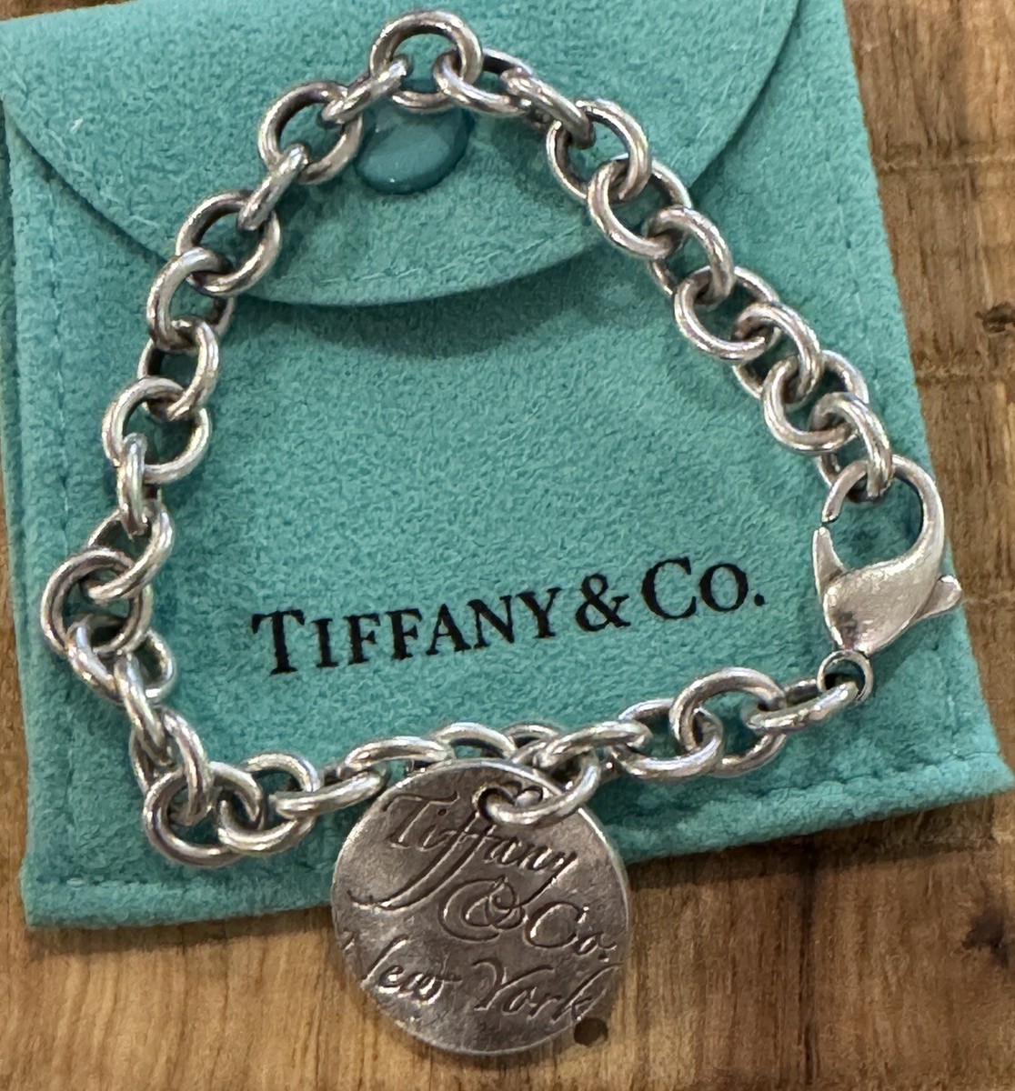 Tiffany & Co. New York Round Tag Charm Bracelet 925 Sterling Tiffany & Co. New York Round Tag Charm Bracelet 925 Sterling