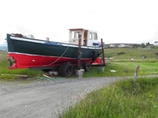 Photo 6x4 Small trawler, Machaire Rabhartaigh Meenlaragh Looking south c2011