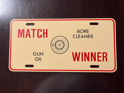 NOVELTY BOOSTER LICENSE PLATE SHOOTING THEME MATCH WINNER GUN OIL BORE CLEANER