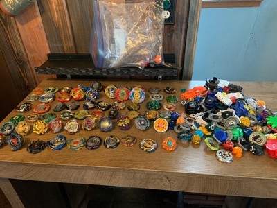 Large Beyblade Lot- 60 Faces - 40 Metal parts & 50+ misc parts