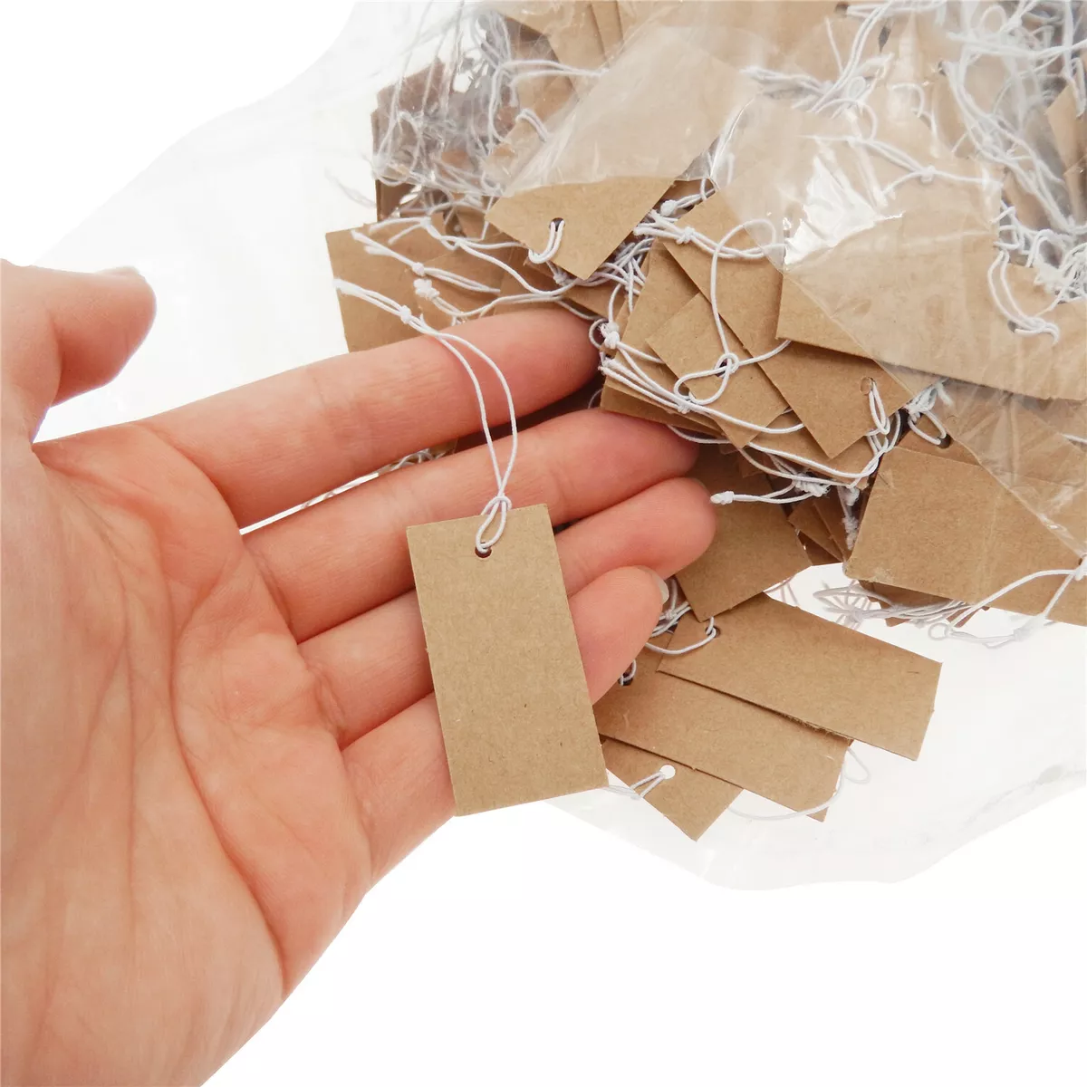 Empty Brown Paper Tag Tied White String Price Tag Gift Stock Photo by  ©nndanko.gmail.com 367877894