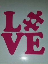 Autism Awareness LOVE Puzzle Piece with Heart decal measures aprx 5" x 4 1/2"