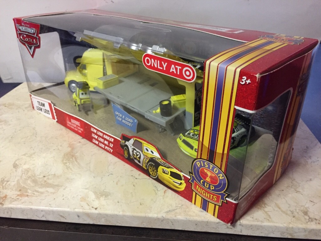 Disney The World of CARS TEAM LEAK LESS Piston Cup Nights RARE