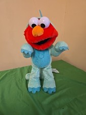 Seasame Street Dino Stomp Elmo 13-Inch Talking Plush Animal Sing and Dance