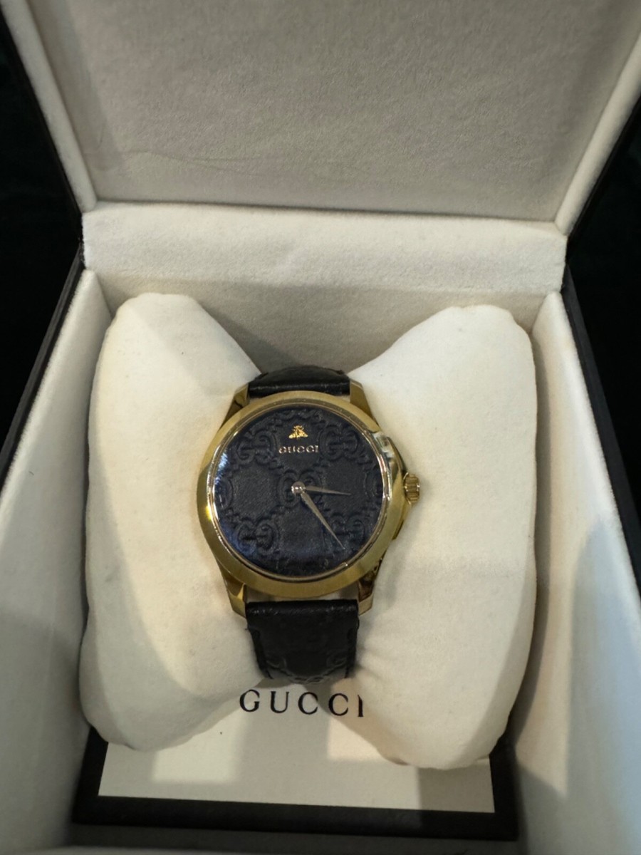 Gucci G-Timeless 38mm Gold plated watch with black leather band