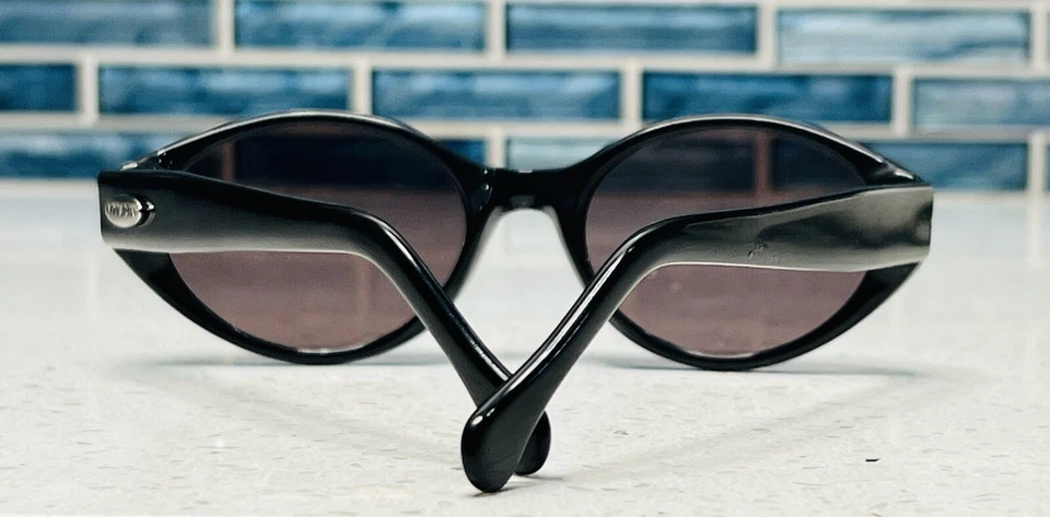 Gafas de sol Adrienne Vittadini de colección negras ovaladas púrpuras lentes marcos brillantes Foto 4 de 4