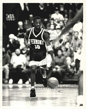 Press Photo University of Vermont Basketball Player Dribbles Down Court