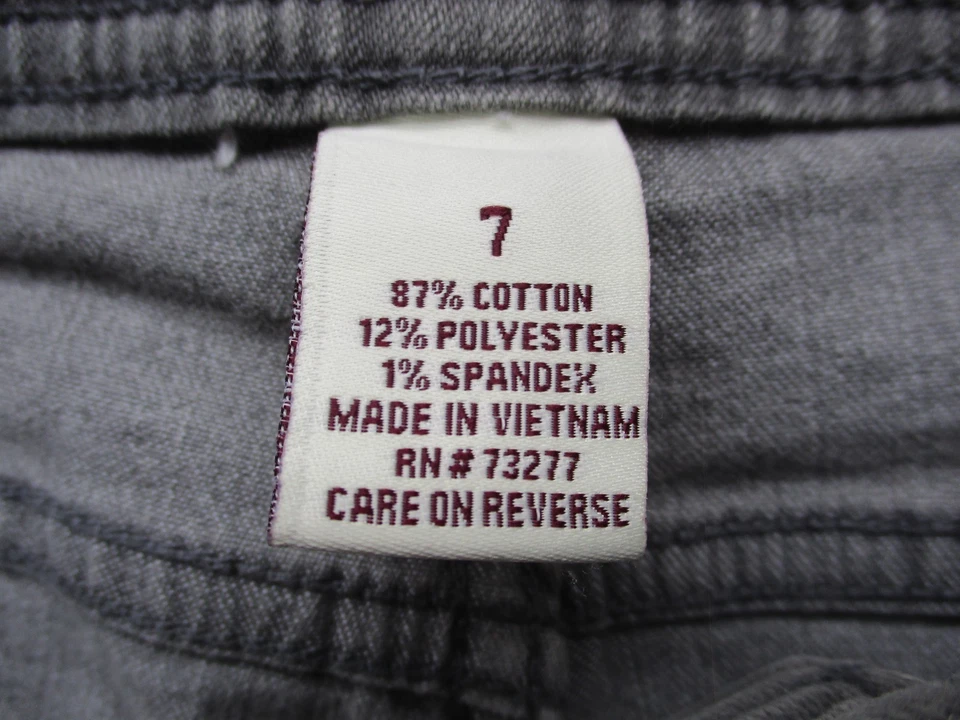 Pantalones de mezclilla elásticos con volantes y dobladillo tiro bajo 7 grises para mujer Foto 4 de 4