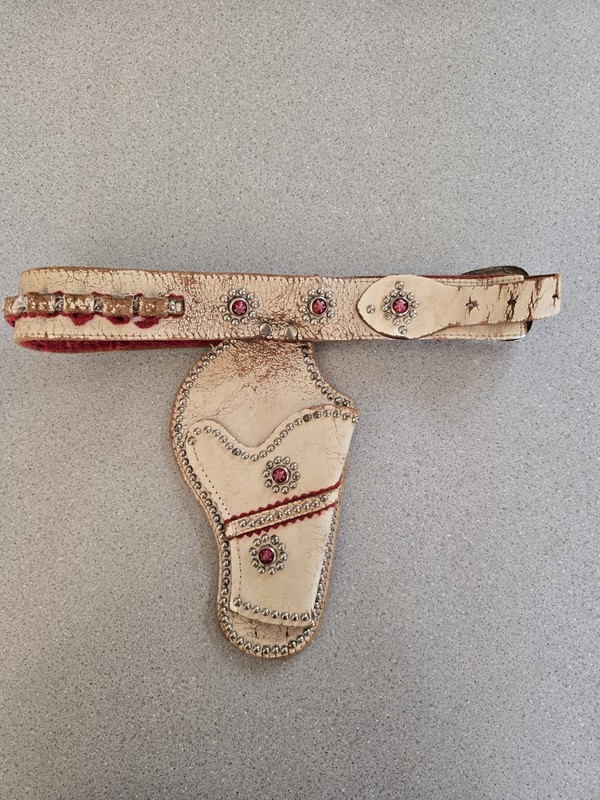 Vintage Gun Holster. White Leather And Red  And Silver Decorations.