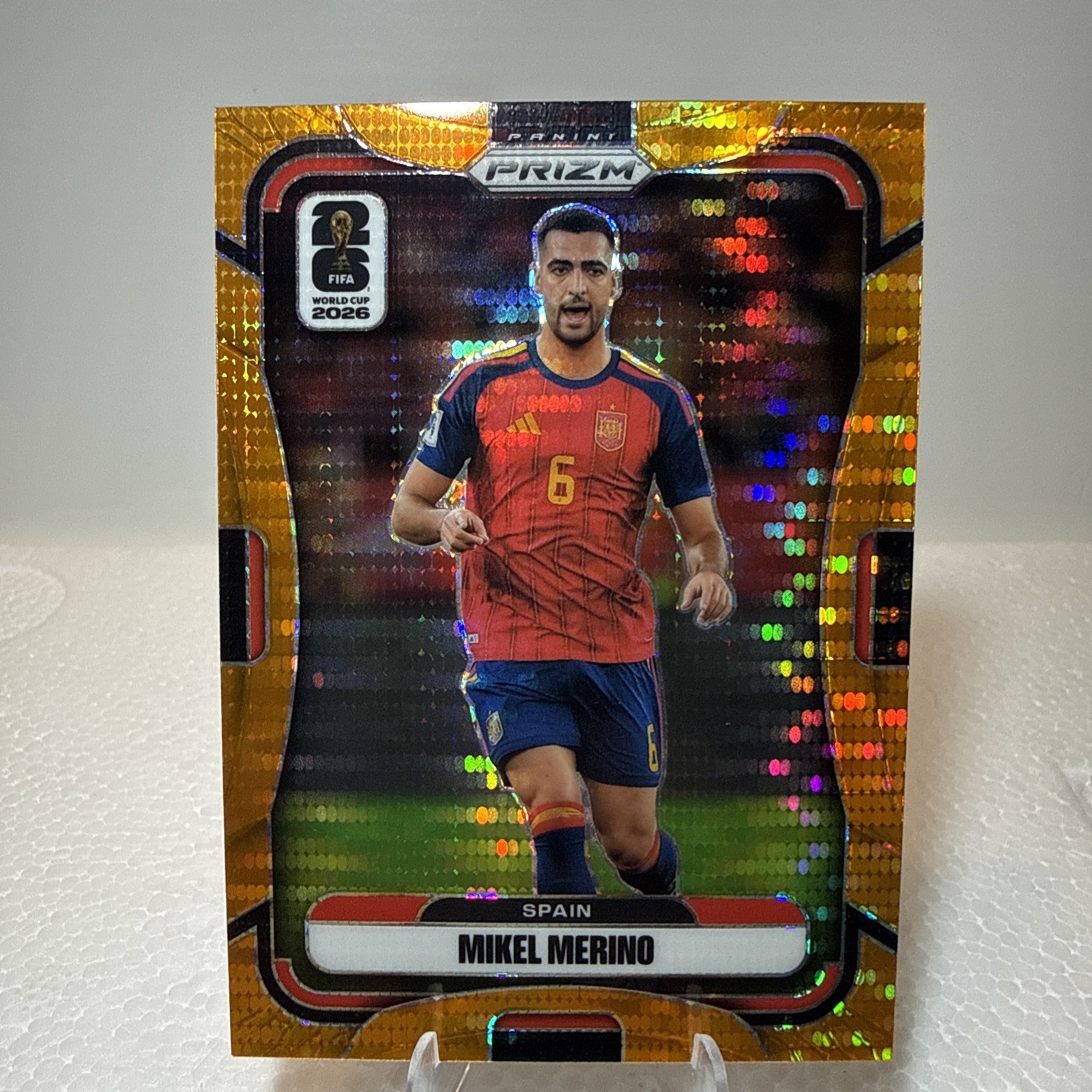 Mikel Merino 2026 Panini Prizm FIFA World Cup Orange Pulsar /99 Spain Arsenal view 1