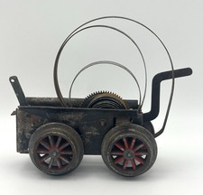 Alter original M&auml;rklin Uhrwerk-Antrieb mit Fahrgestell (4 R&auml;der) &ndash; Vorkrieg