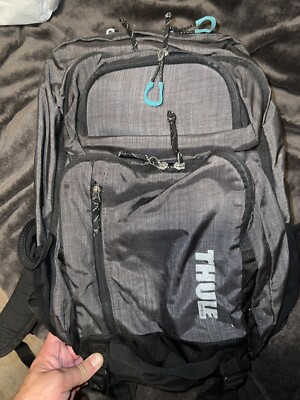 Thule Leeds Black Backpack Stretch side pockets 4 pockets inside storage