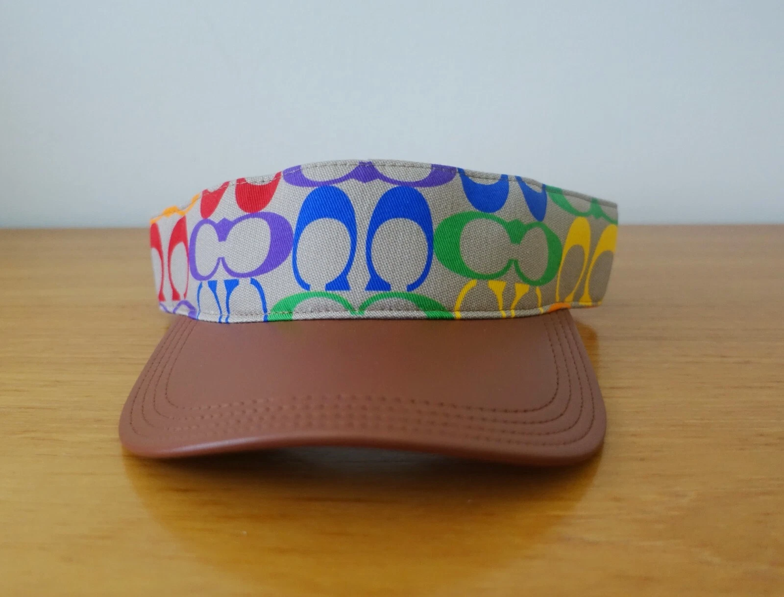 COACH UNISEX RAINBOW SIGNATURE MULTICOLOR VISOR. NWT