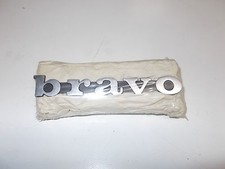 TARGHETTA LATERALE " BRAVO " PER FIANCHETTI LATERALI PIAGGIO BRAVO 50