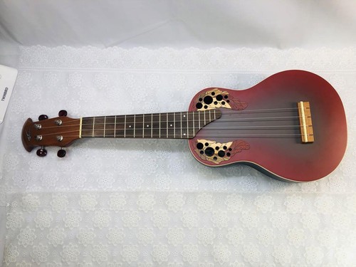 Ukulele rosso applausi