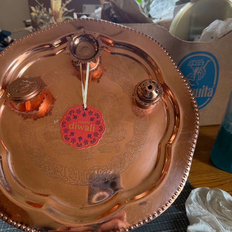 This is a 12” decorative silver-plated Diwali thali. Used for Festival of Lights