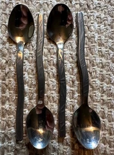LOT OF 4 5 O’CLOCK TEASPOONS GOURMET SETTINGS NEW WAVE STAINLESS FLATWARE