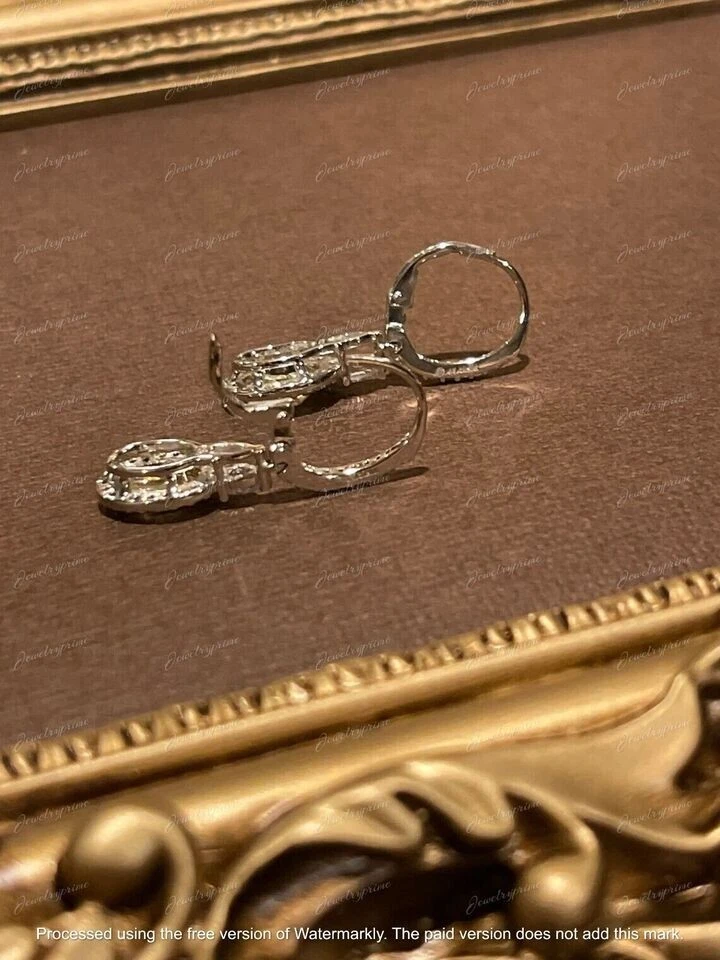 Pendientes colgantes de diamantes canarios de corte ovalado de 4,00 quilates con acabado en oro blanco de 14 quilates Foto 3 de 4