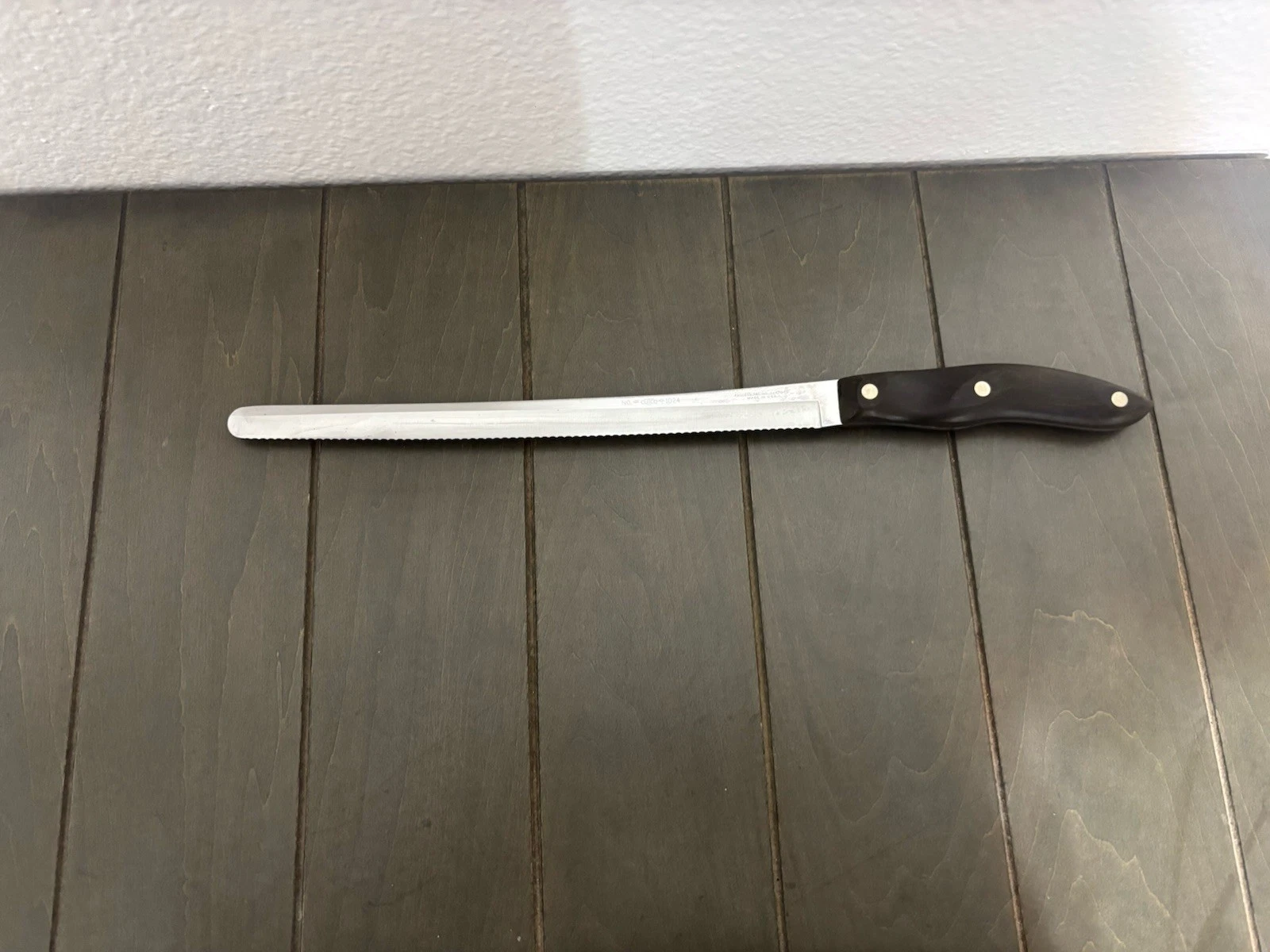 Cutco 1024 Stainless Steel Bread Knife 10 in Black Plastic Handle