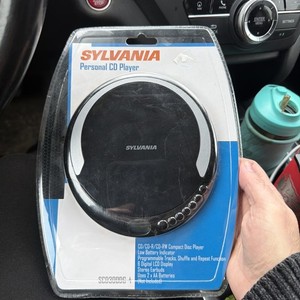 Sylvania Personal CD Player New Sealed Black With Earbuds NEW SCD300DG-4