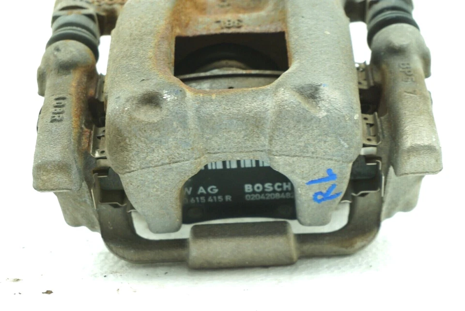 PINZA DE FRENO TRASERA IZQUIERDA LADO CONDUCTOR VOLKSWAGEN PASSAT B7 2012-2014 SEDÁN 74 K OEM Foto 4 de 4
