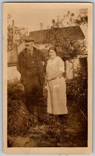 Vtg B&W Snapshot Couple In Garden Man In Flat Cap Woman Gingham Dress 1920s