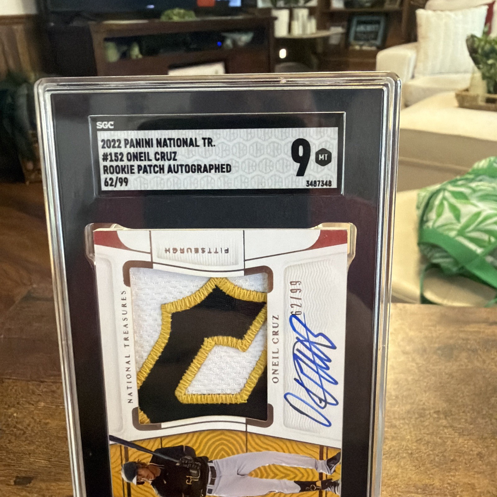 Oneil Cruz 2022 National Treasures #RPA Numbered /99 Rookie Patch Auto RC SGC 9 view 7