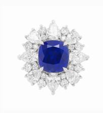 Features a Blue Cushion Sapphire Lab-Created White Diamond Flower Cluster Ring