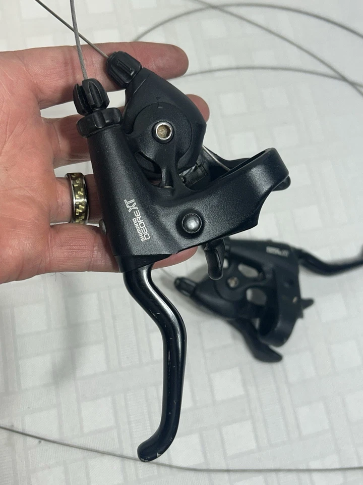 Palancas de cambio delanteras traseras Shimano Deore XT 3x7 velocidades ST-M095 bicicleta MTB Foto 2 de 4