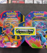 Pokemon Mega Charizard -Set of 2- Tins Sealed In Hand NEW