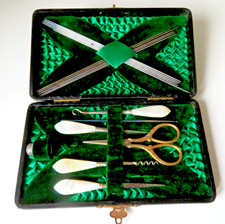 ANTIQUE SEW KIT,10 KNIT PINS,CORK SCREW.STILETTO'S,BUTTON & CROCHET HOOK,ETC.,